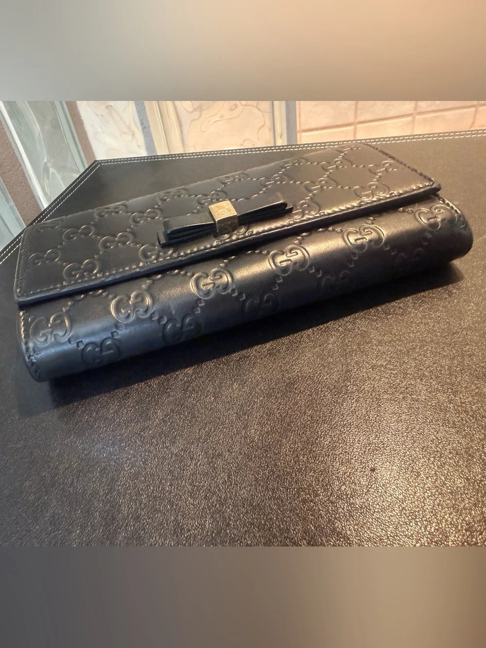 Gucci Black Guccissima Leather Bow Flap Continental Wallet. EUC.